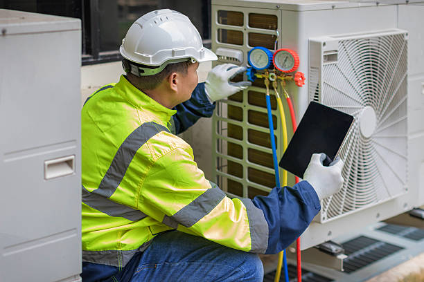 Professional Hvac technician working in Baldwin, WI